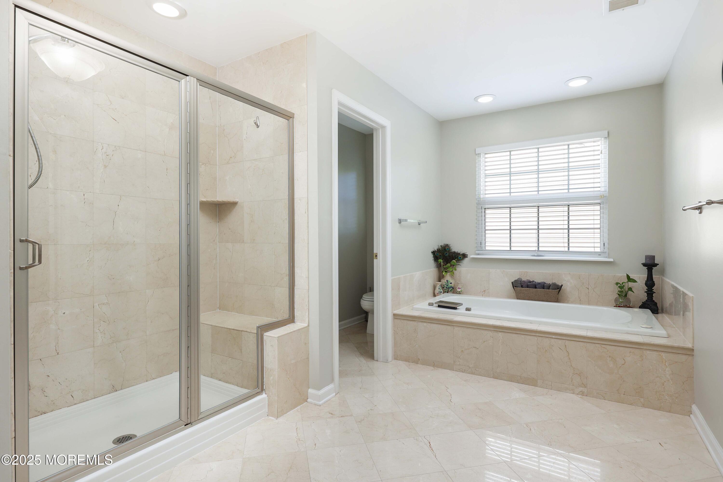 1 Boyd Road Hazlet, NJ 07730 - Photo 25 of 52 a bathroom with a tub a sink and a shower