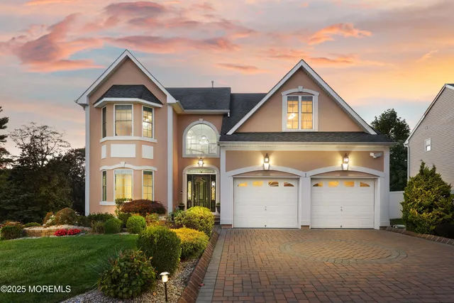 an aerial view of house with yard