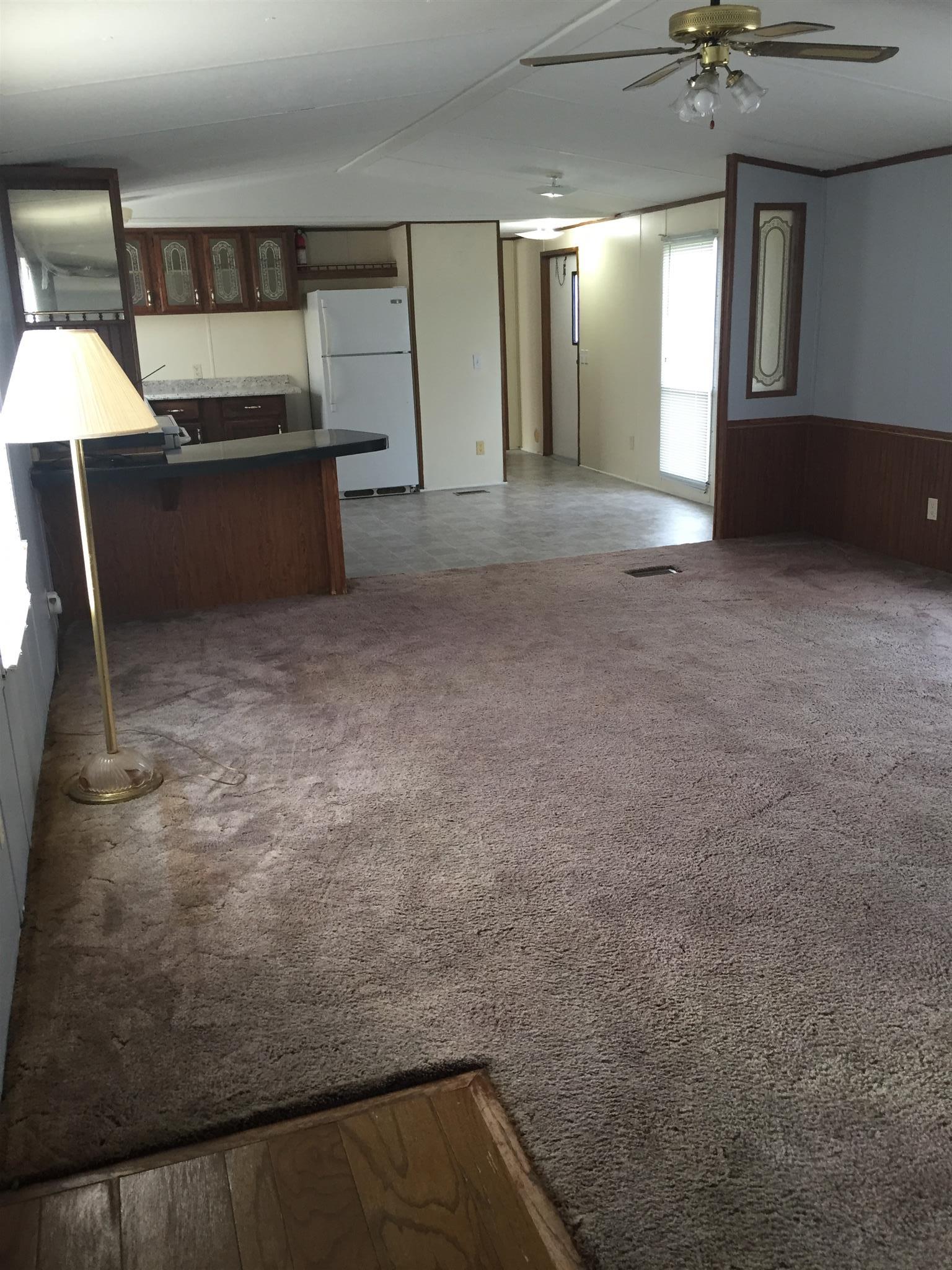 2175 Baggett Road Palmyra, TN 37142 - Photo 6 of 19 a view of livingroom with furniture and window