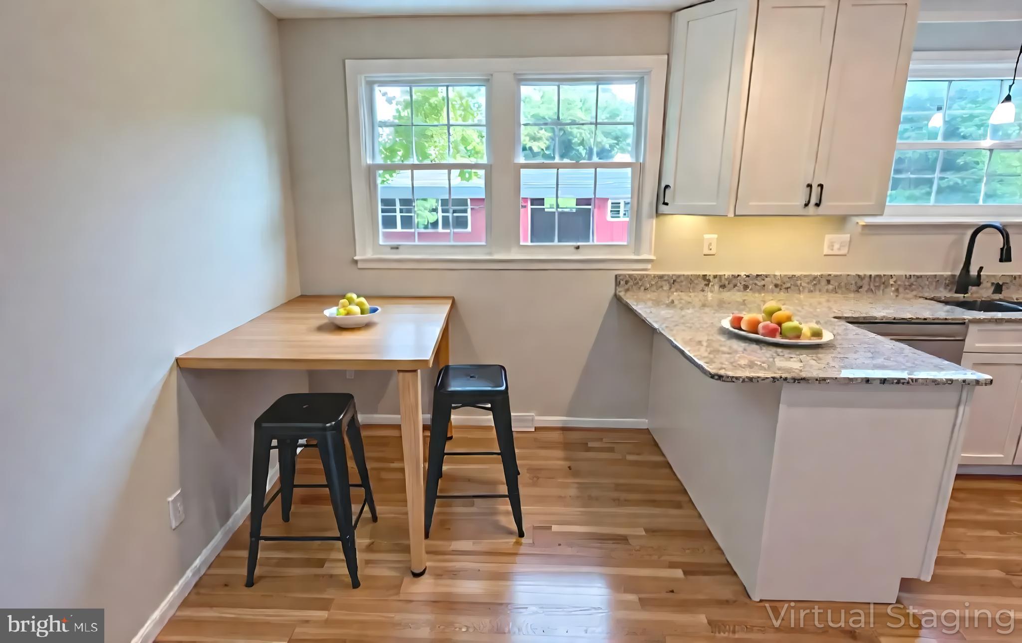 1900 Shetland Road Finksburg, MD 21048 - Photo 11 of 32 a kitchen with a sink cabinets and wooden floor