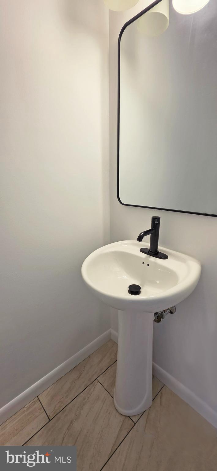 1900 Shetland Road Finksburg, MD 21048 - Photo 13 of 32 a bathroom with a sink and mirror