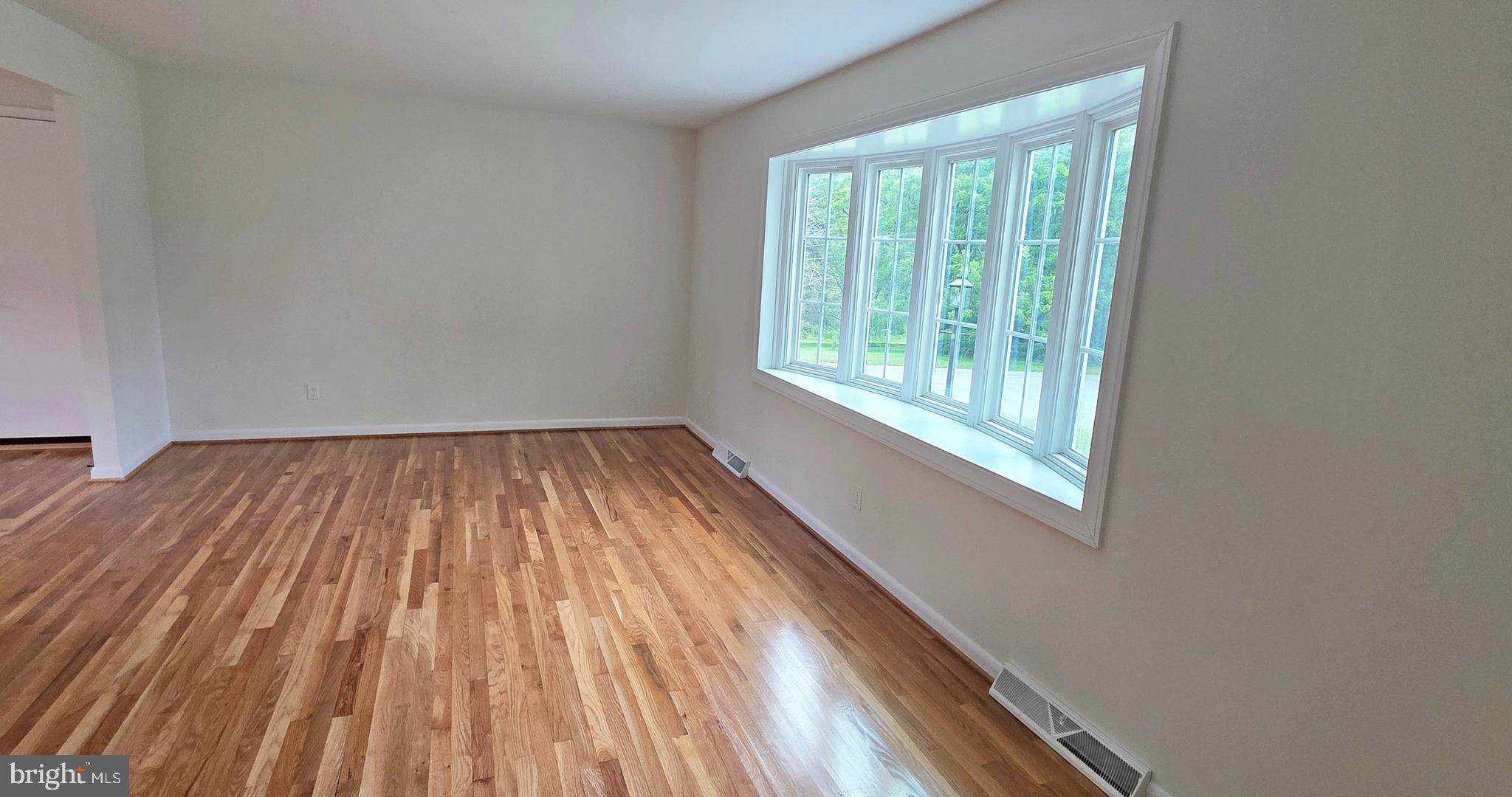 1900 Shetland Road Finksburg, MD 21048 - Photo 4 of 32 a view of a room with wooden floor and balcony