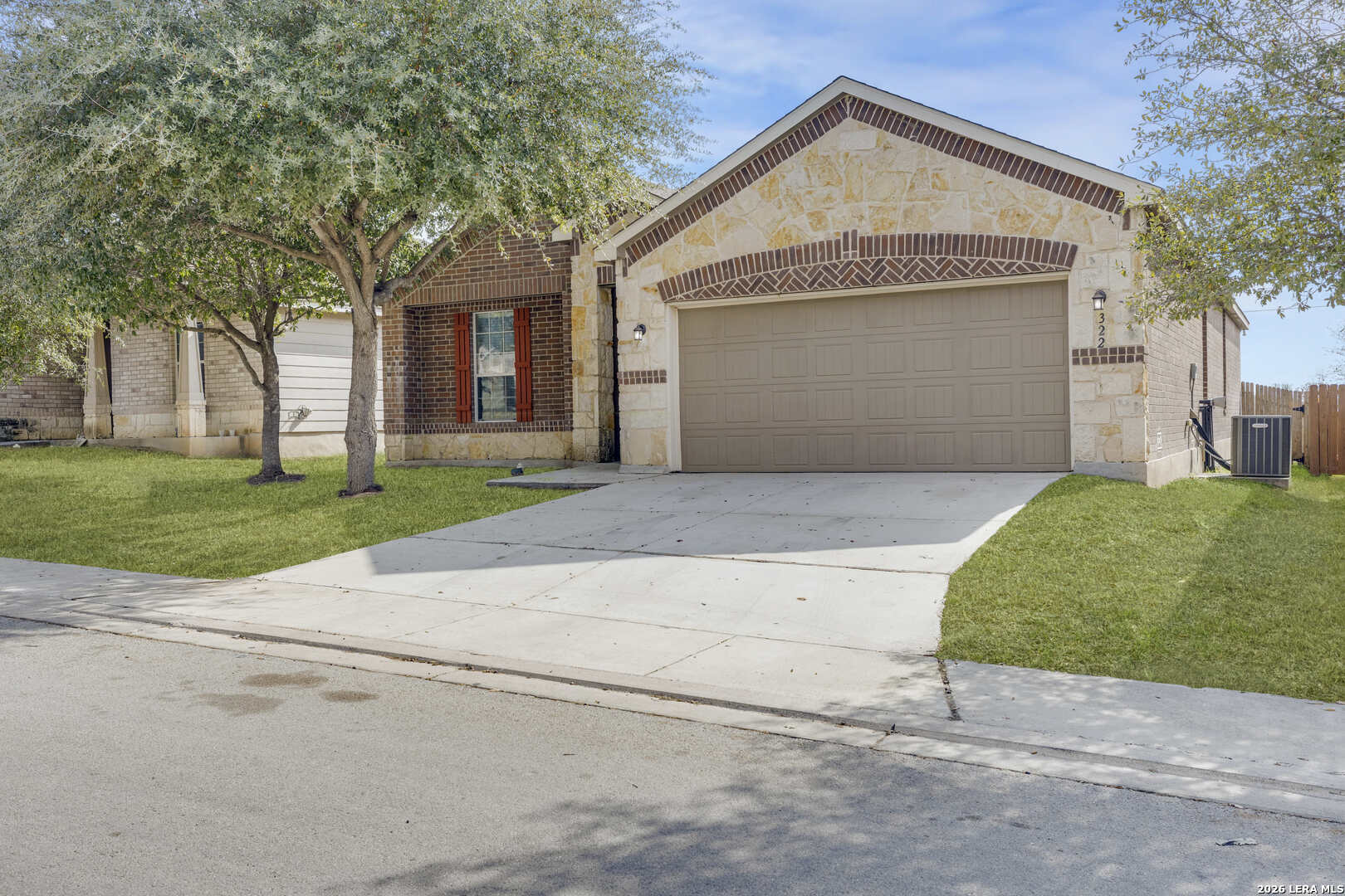 322 Walnut Crest Selma, TX 78154 - Photo 2 of 33 a view of a house with a yard