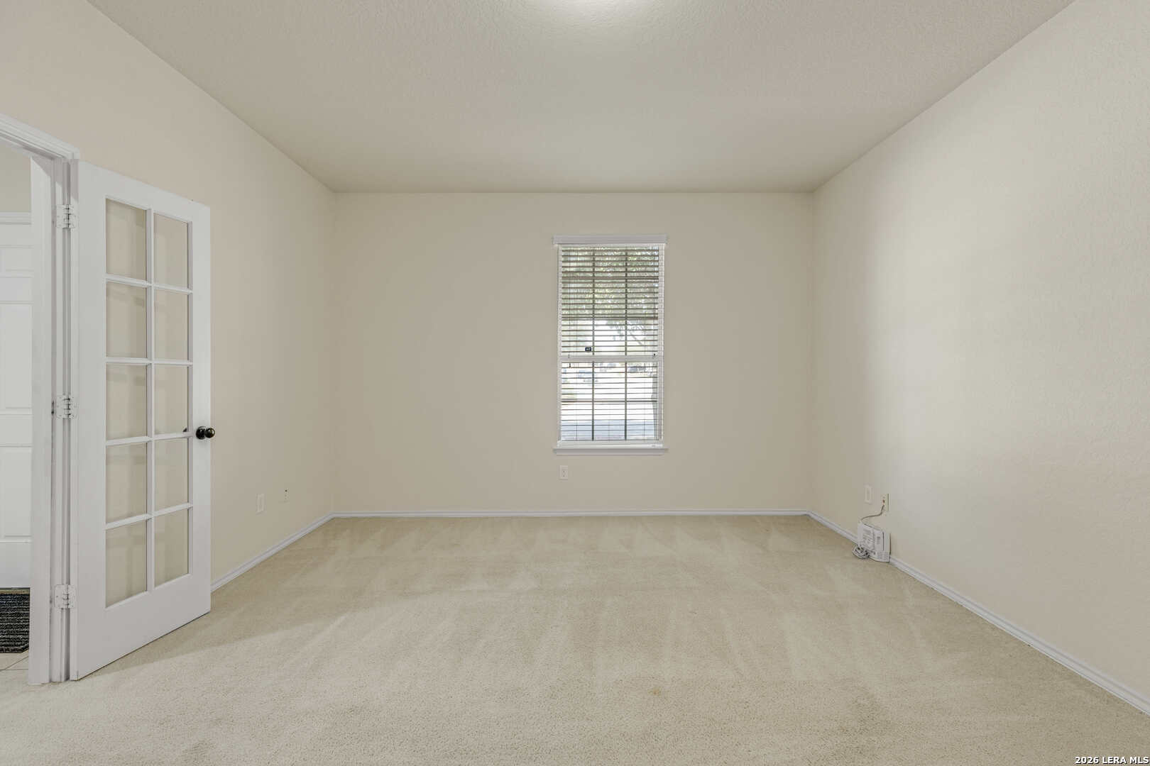 322 Walnut Crest Selma, TX 78154 - Photo 7 of 33 an empty room with a window