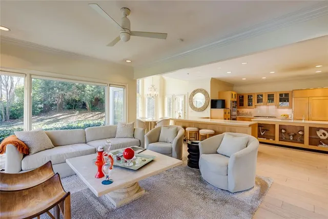 a bathroom with a tub sink and mirror on the wall
