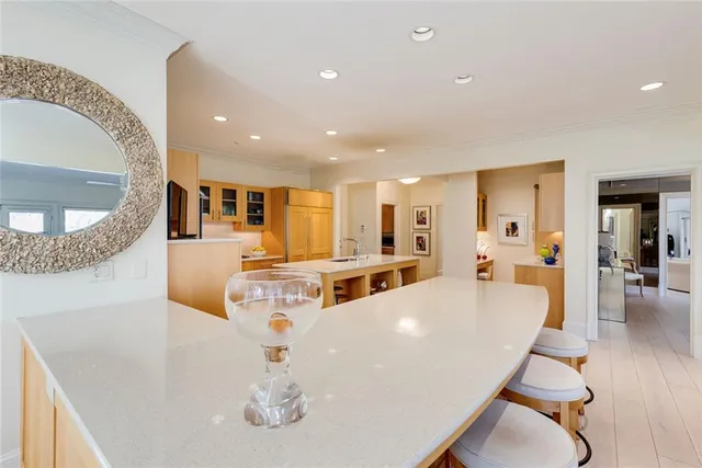 a spacious bedroom with a bed and a fireplace