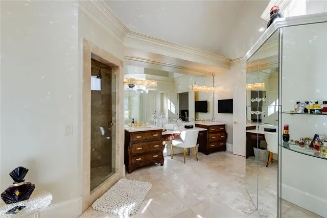a bathroom with a tub sink and mirror