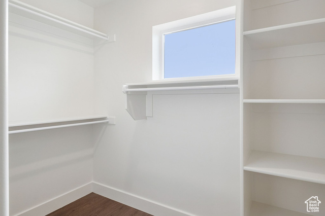 1615 North Angel Street, Unit I Layton, UT 84041 - Photo 29 of 56 Spacious closet featuring dark wood-type flooring