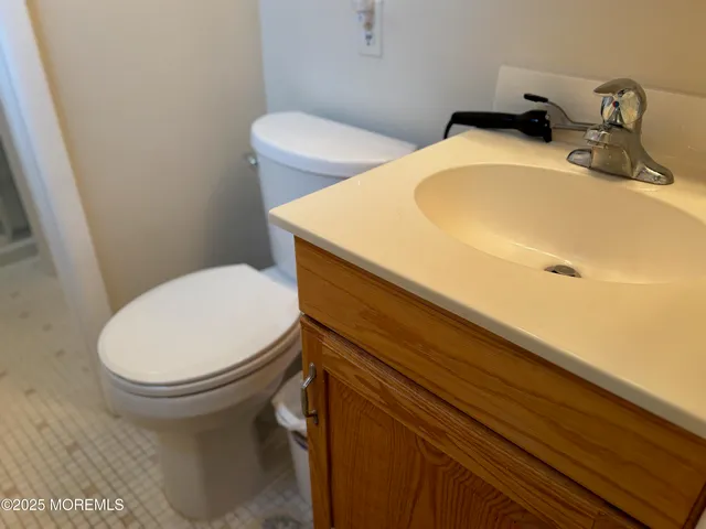 a bathroom with a sink and a toilet