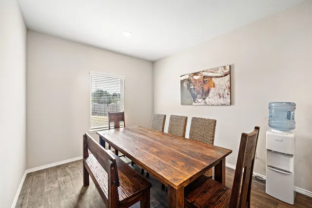 a view of a dining room with furniture