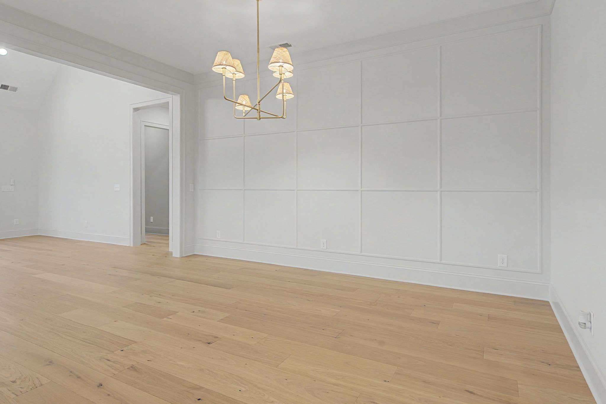 7032 Kinderhook Road Nashville, TN 37221 - Photo 16 of 91 a view of an empty room with a chandelier fan