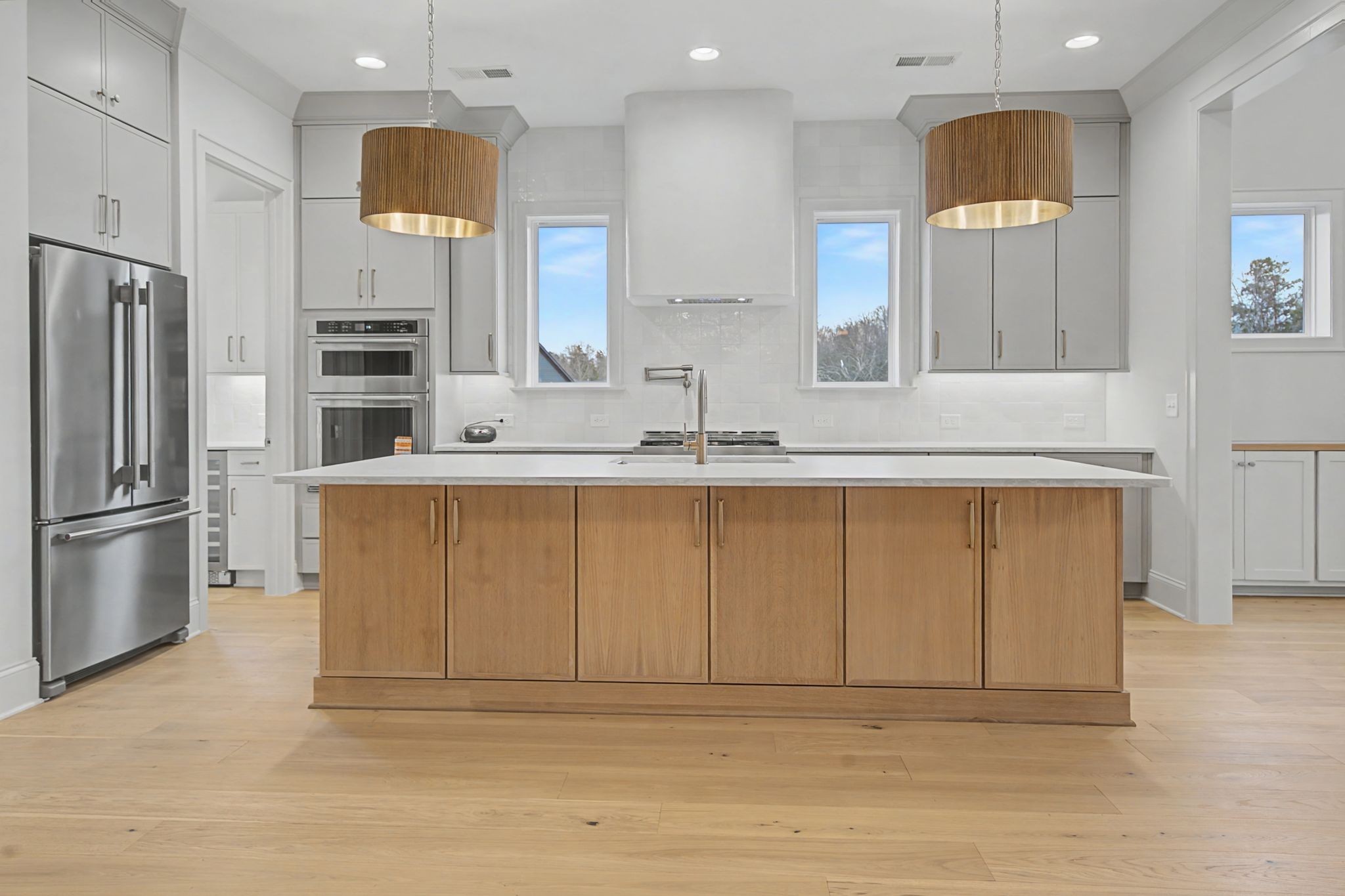 7032 Kinderhook Road Nashville, TN 37221 - Photo 18 of 91 a kitchen with stainless steel appliances granite countertop a stove a sink and a refrigerator