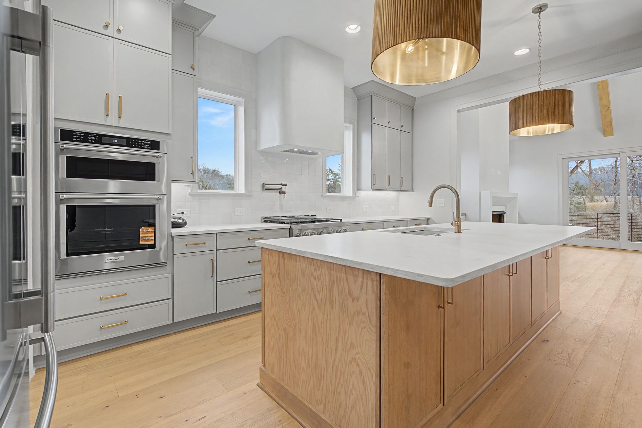 7032 Kinderhook Road Nashville, TN 37221 - Photo 19 of 91 a kitchen with a sink cabinets and appliances