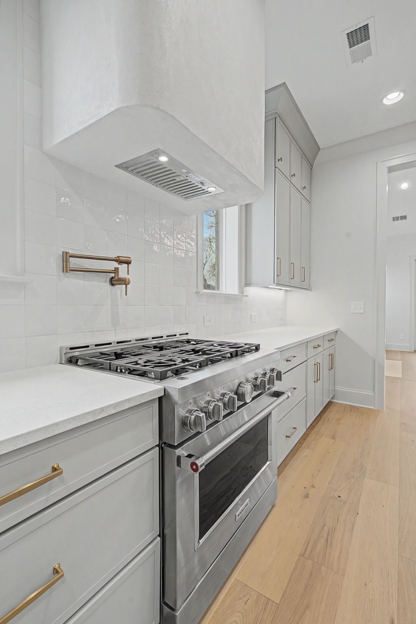 7032 Kinderhook Road Nashville, TN 37221 - Photo 22 of 91 a white stove top oven sitting inside of a kitchen