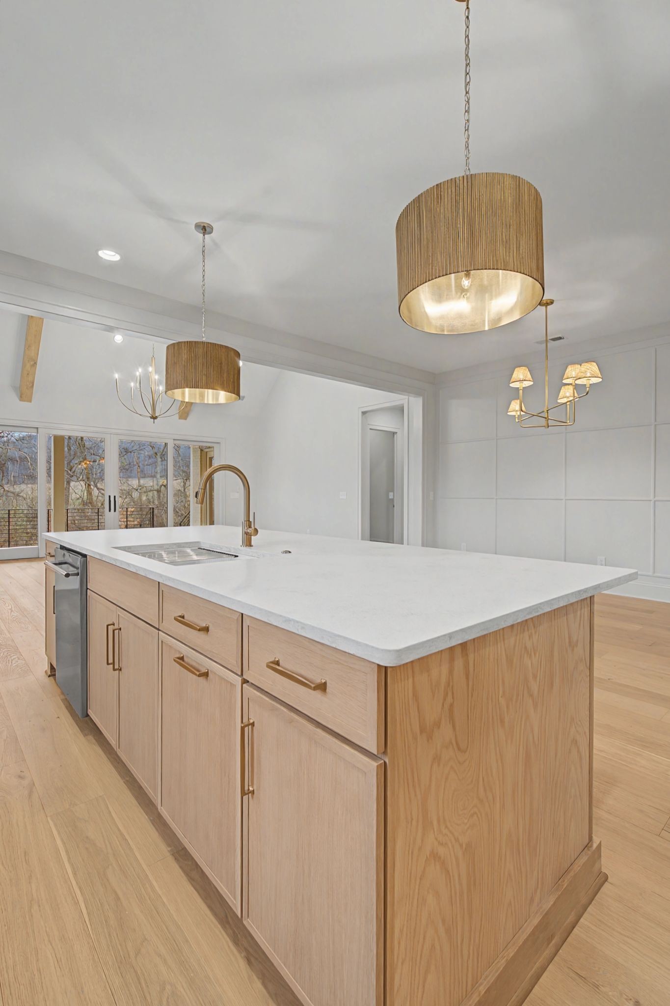 7032 Kinderhook Road Nashville, TN 37221 - Photo 23 of 91 a kitchen with kitchen island granite countertop a stove a sink a counter space and cabinets