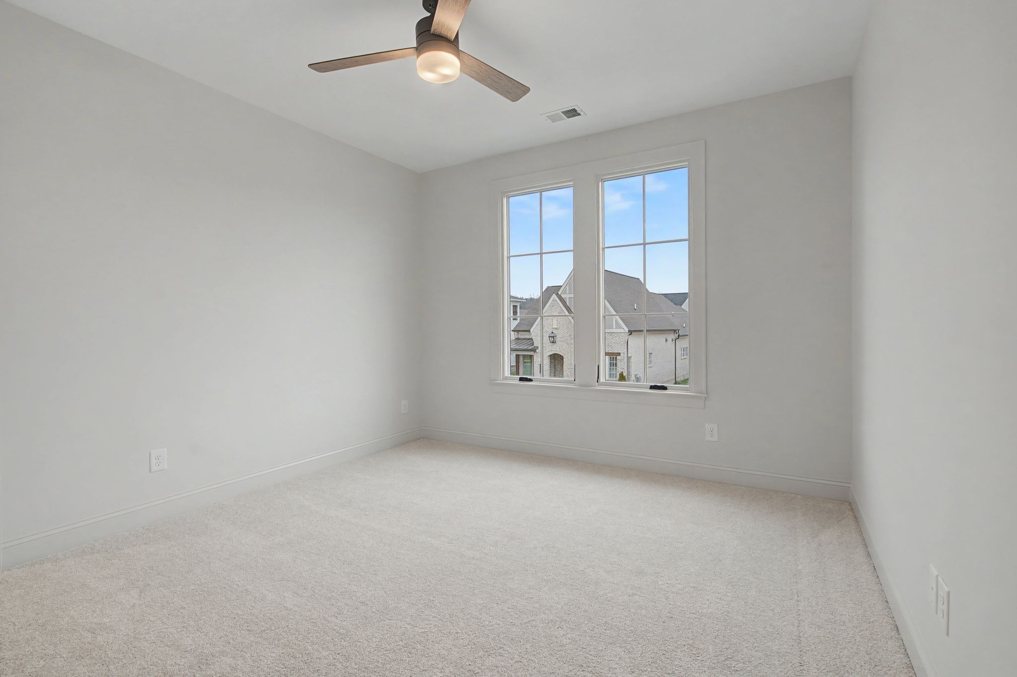 7032 Kinderhook Road Nashville, TN 37221 - Photo 51 of 91 an empty room with windows and fan