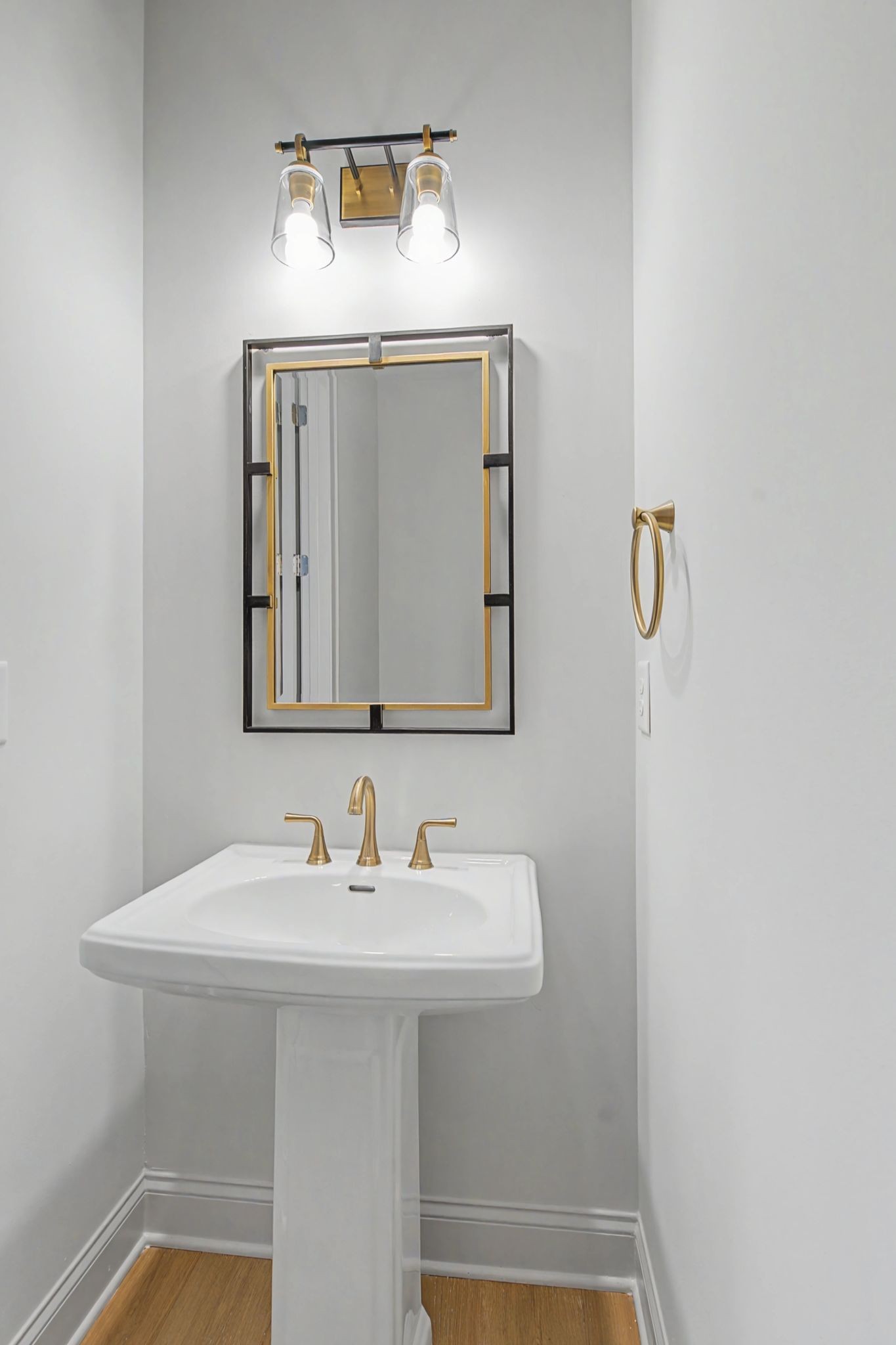 7032 Kinderhook Road Nashville, TN 37221 - Photo 58 of 91 a bathroom with a sink a mirror and vanity