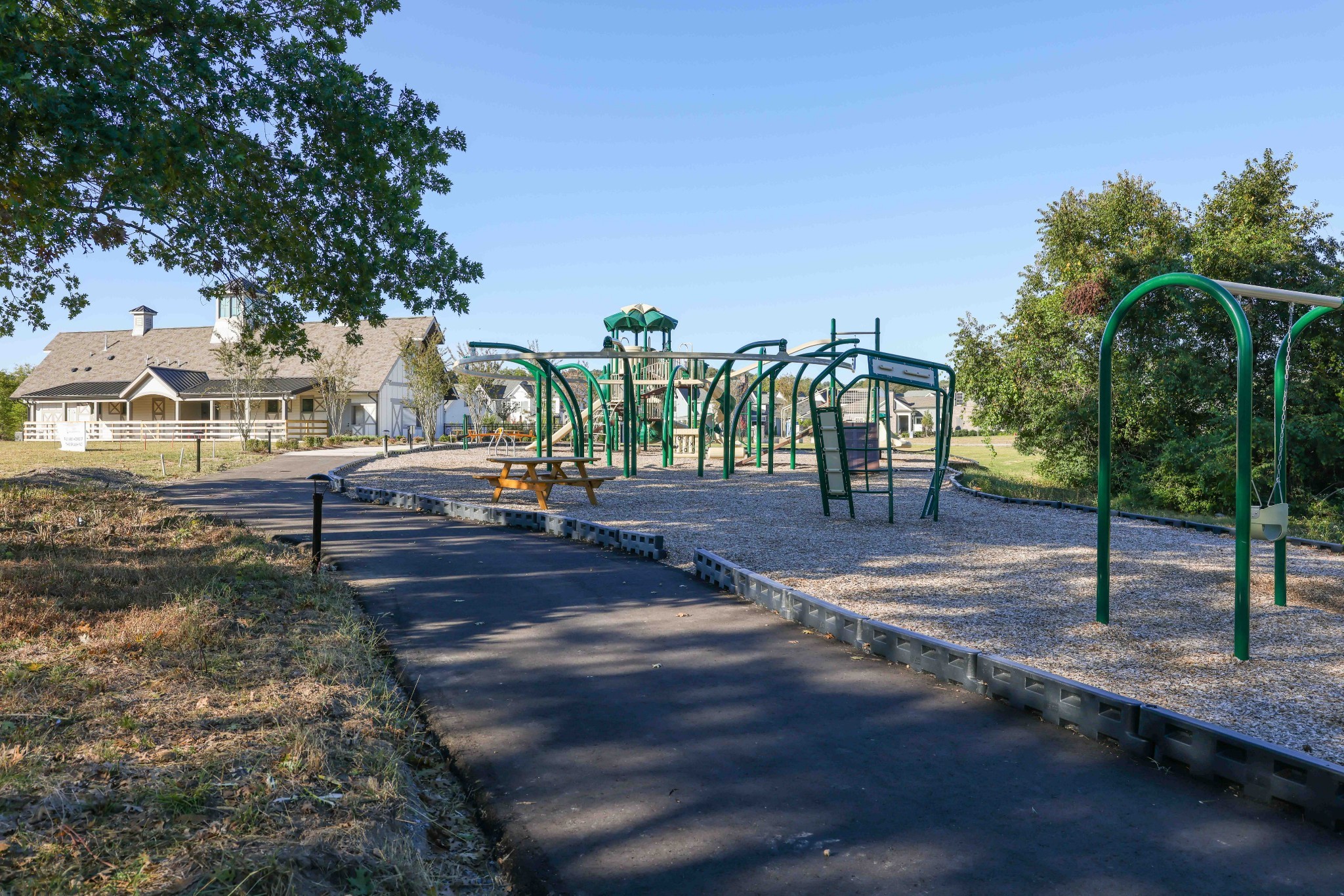 7032 Kinderhook Road Nashville, TN 37221 - Photo 89 of 91 a view of a park with swings and slides