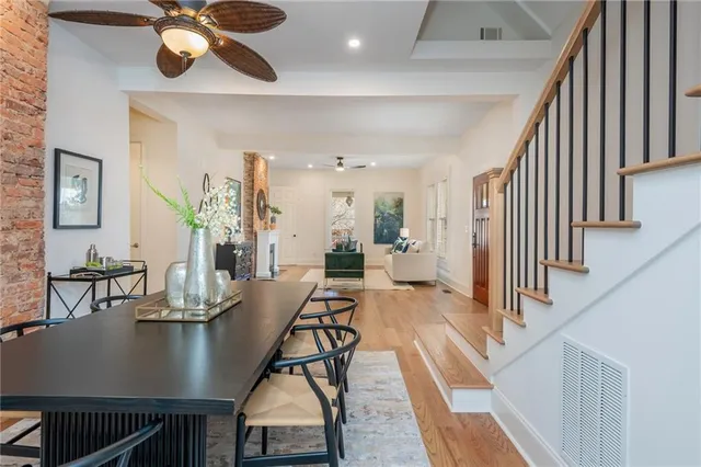 a bedroom with a bed and a lamp on table