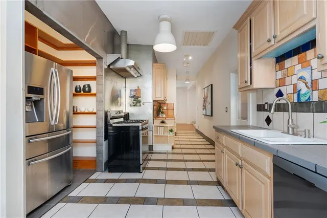 a living room with furniture and windows