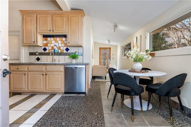 a bedroom with bed and a window