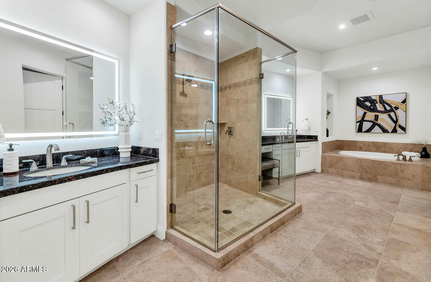8 Biltmore Estate, Unit 209 Phoenix, AZ 85016 - Photo 25 of 49 a spacious bathroom with a shower sink and mirror
