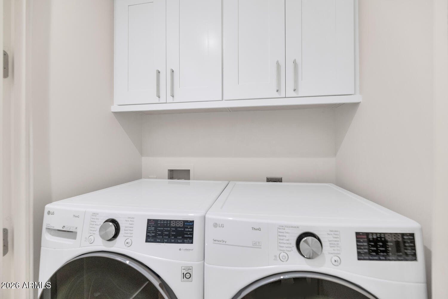 8 Biltmore Estate, Unit 209 Phoenix, AZ 85016 - Photo 35 of 49 a utility room with dryer and washer