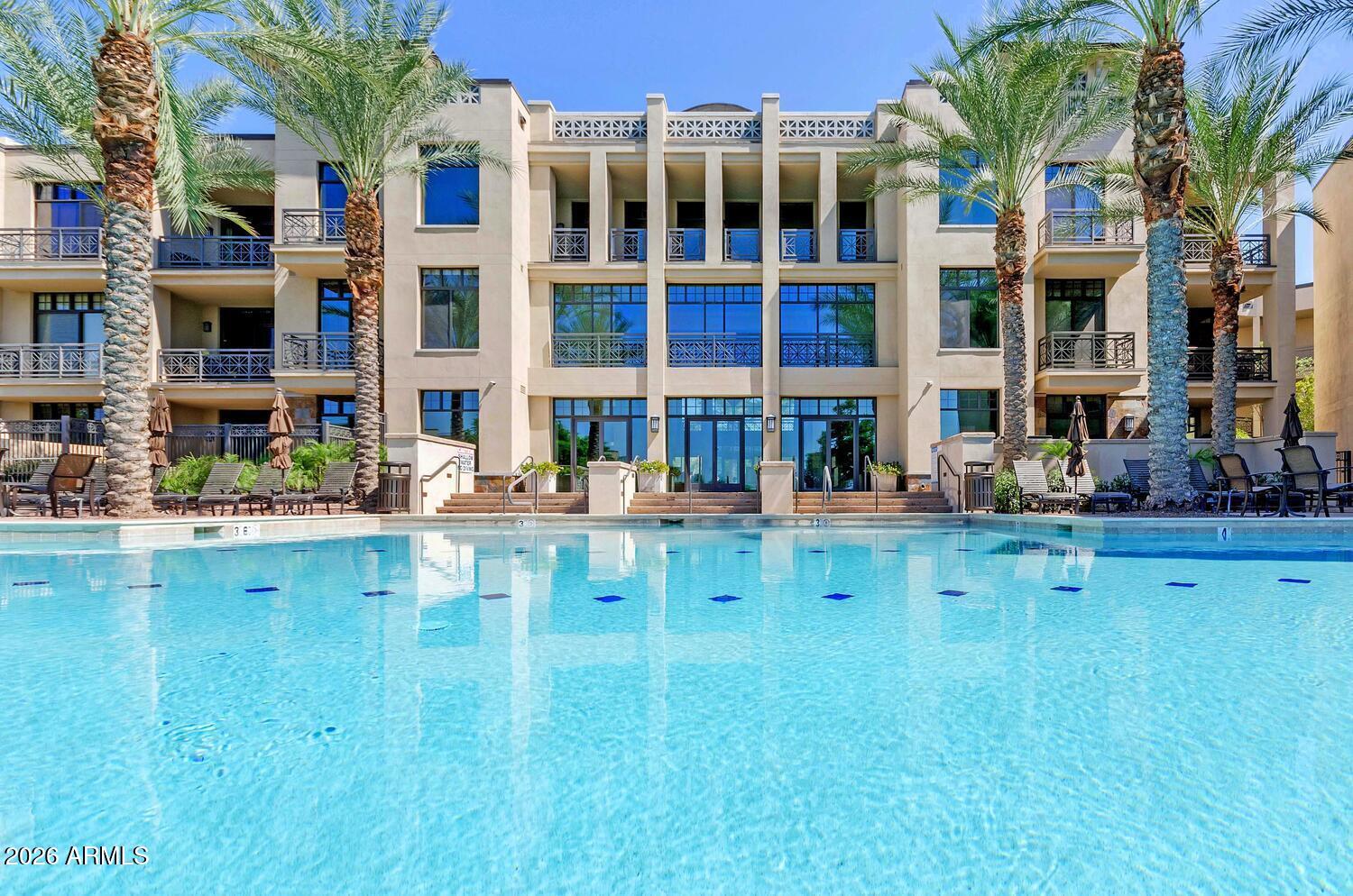 8 Biltmore Estate, Unit 209 Phoenix, AZ 85016 - Photo 37 of 49 a swimming pool view with a outdoor seating