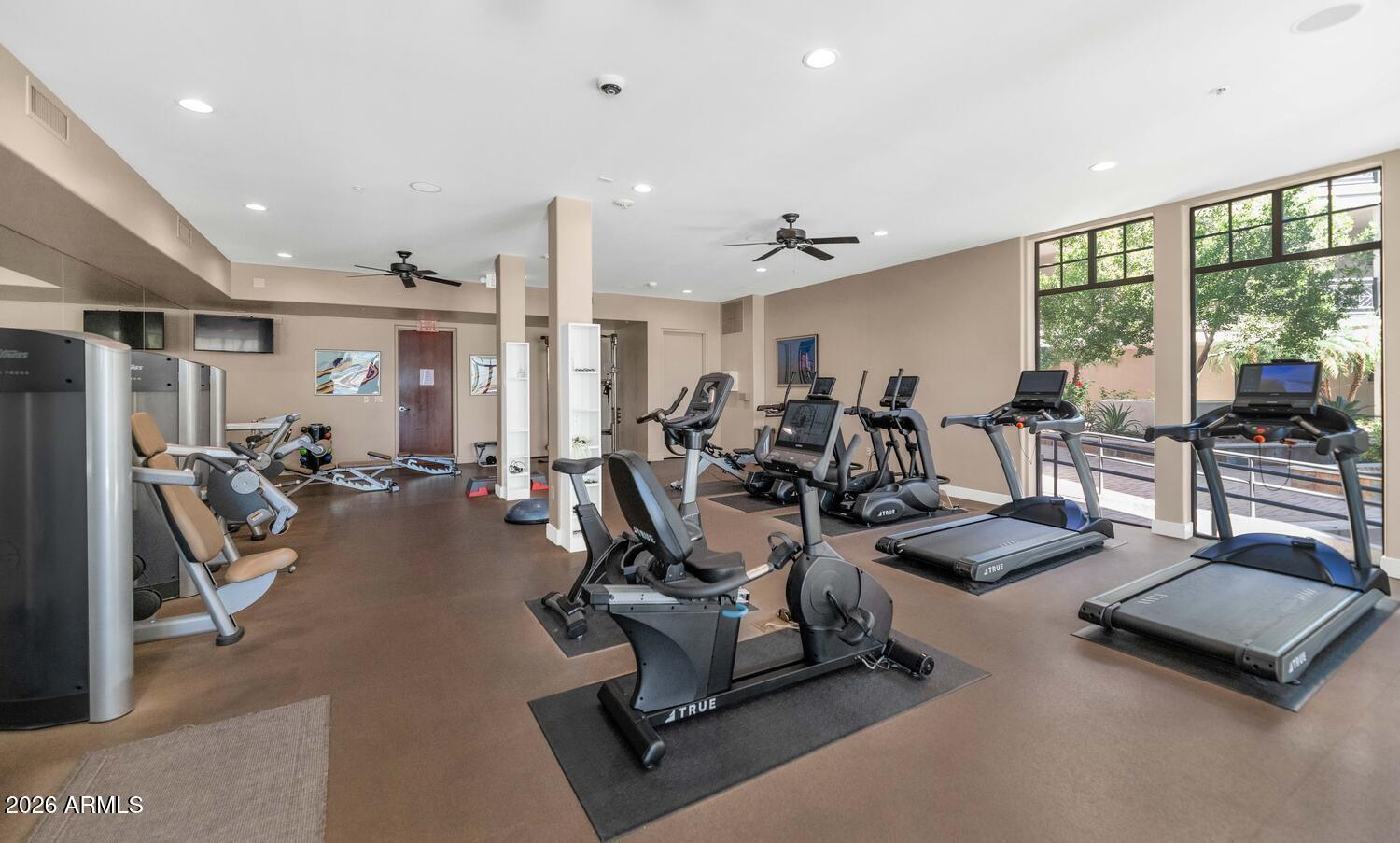 8 Biltmore Estate, Unit 209 Phoenix, AZ 85016 - Photo 44 of 49 a view of a room with gym equipment