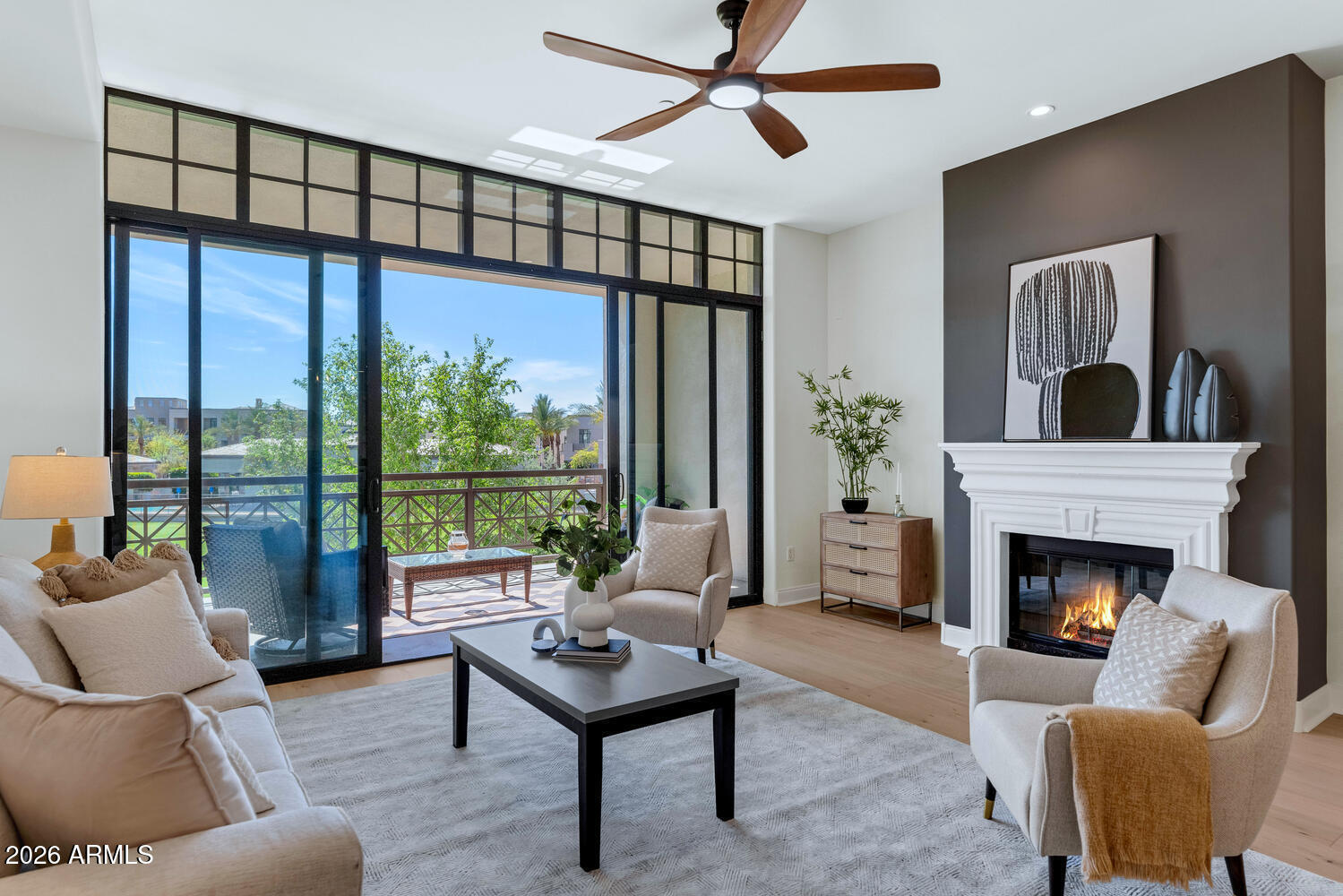 8 Biltmore Estate, Unit 209 Phoenix, AZ 85016 - Photo 6 of 49 a living room with furniture fireplace and a large window
