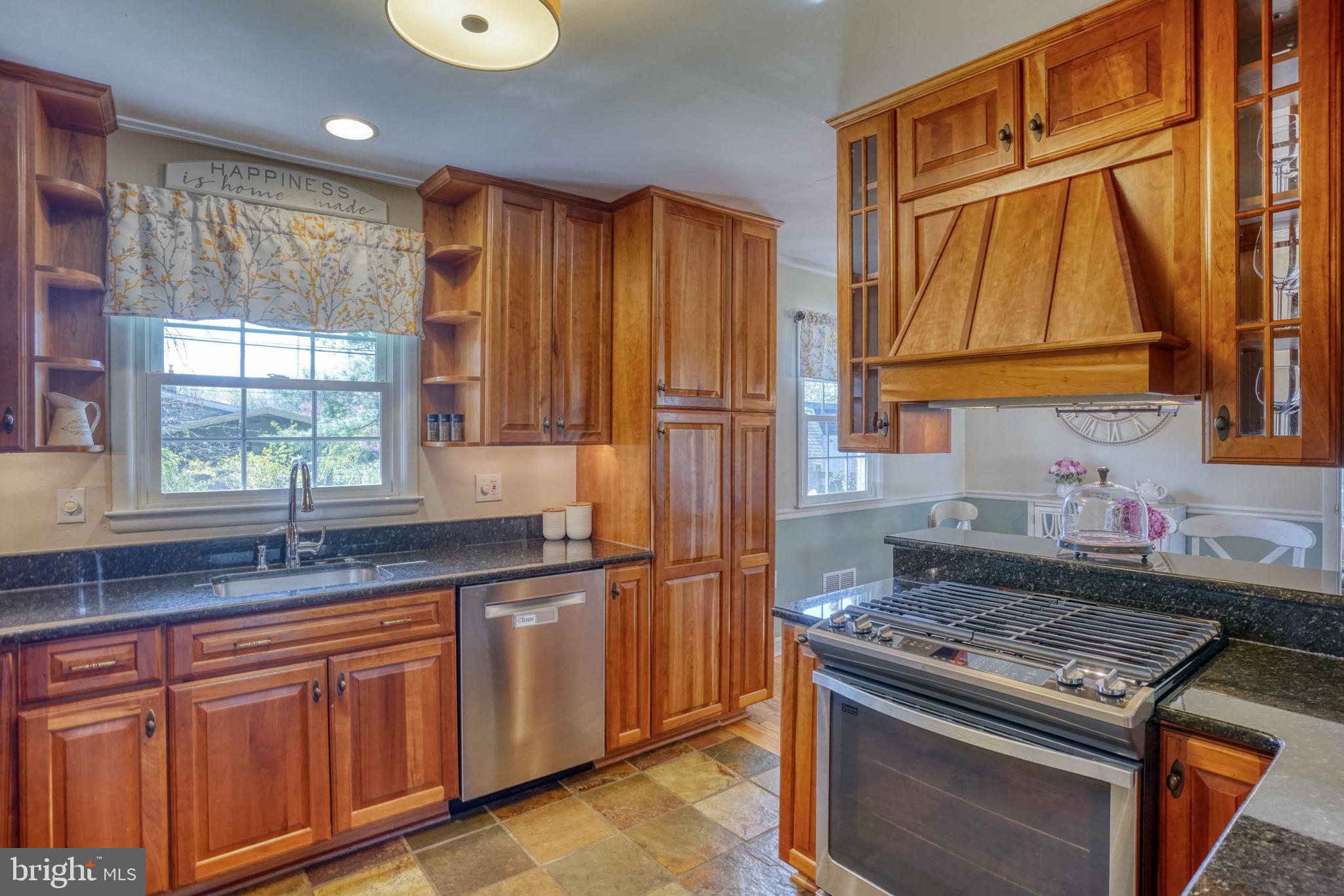 604 Ivydale Road Wilmington, DE 19803 - Photo 11 of 35 Custom cabinets and range hood