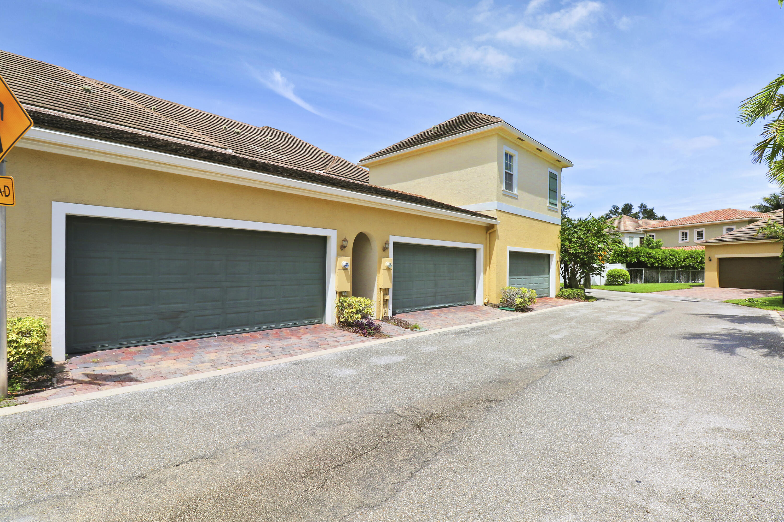 151 Mulligan Place Jupiter, FL 33458 - Photo 22 of 23 Two Car Garage