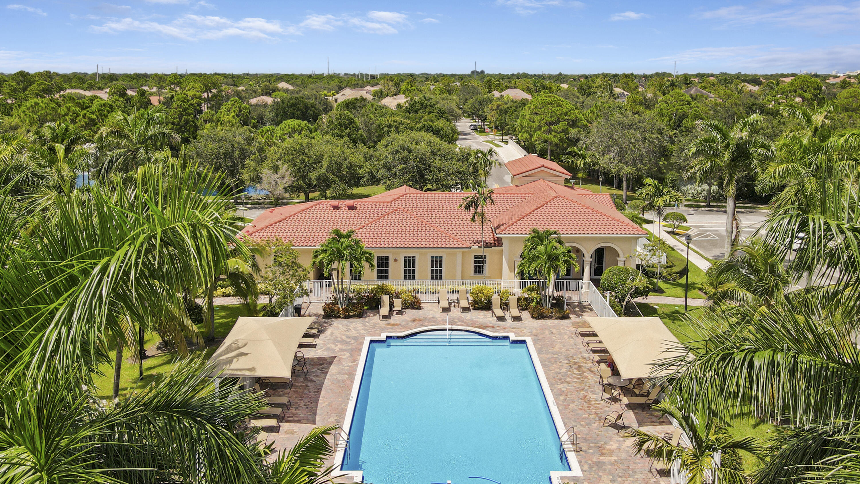151 Mulligan Place Jupiter, FL 33458 - Photo 3 of 23 Clubhouse and Pool