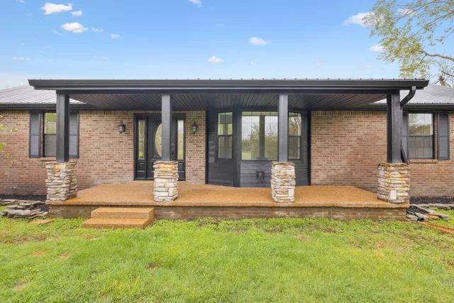 front view of a house with a patio