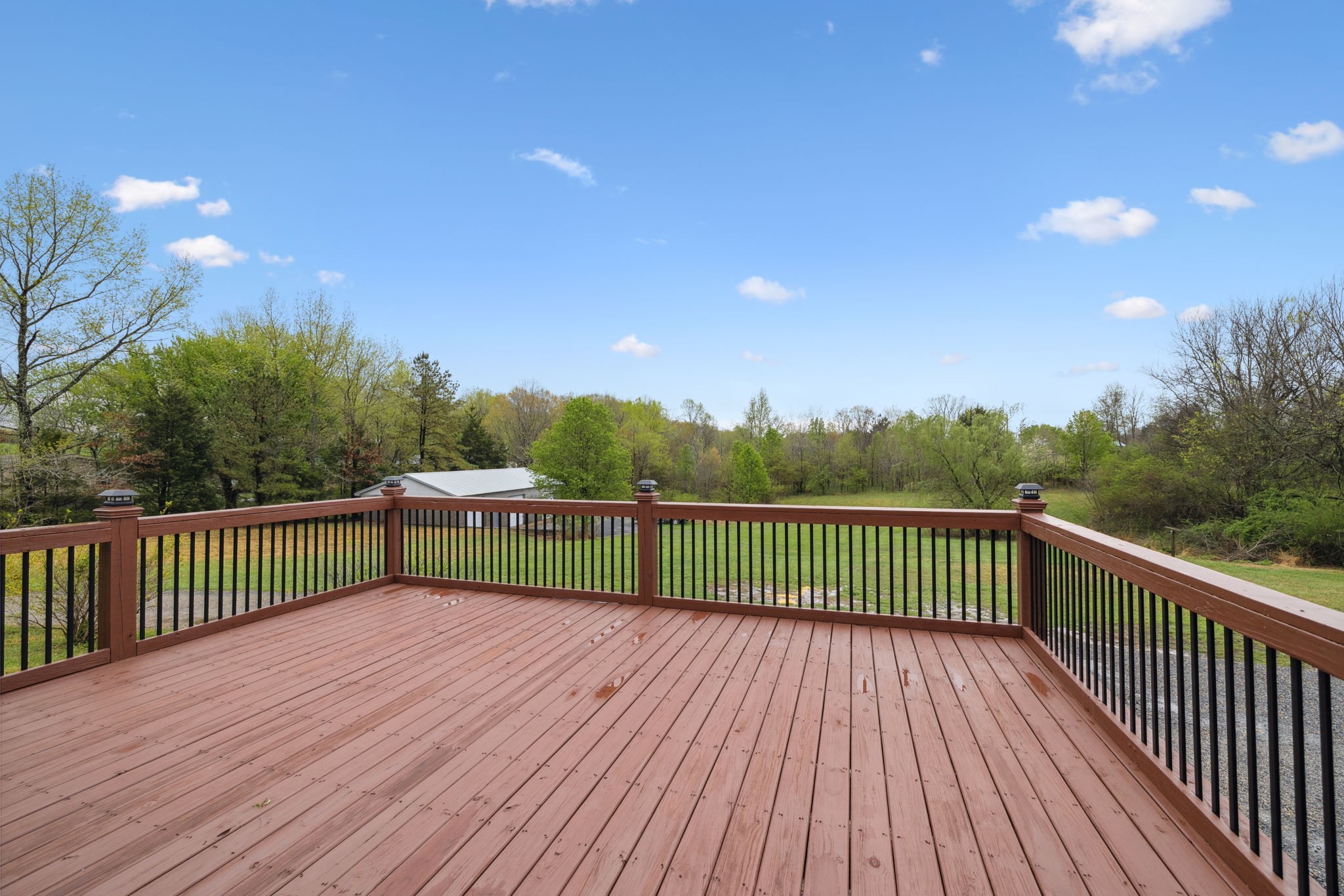 500 Brown Road Bon Aqua, TN 37025 - Photo 23 of 35 a view of balcony with wooden floor and fence