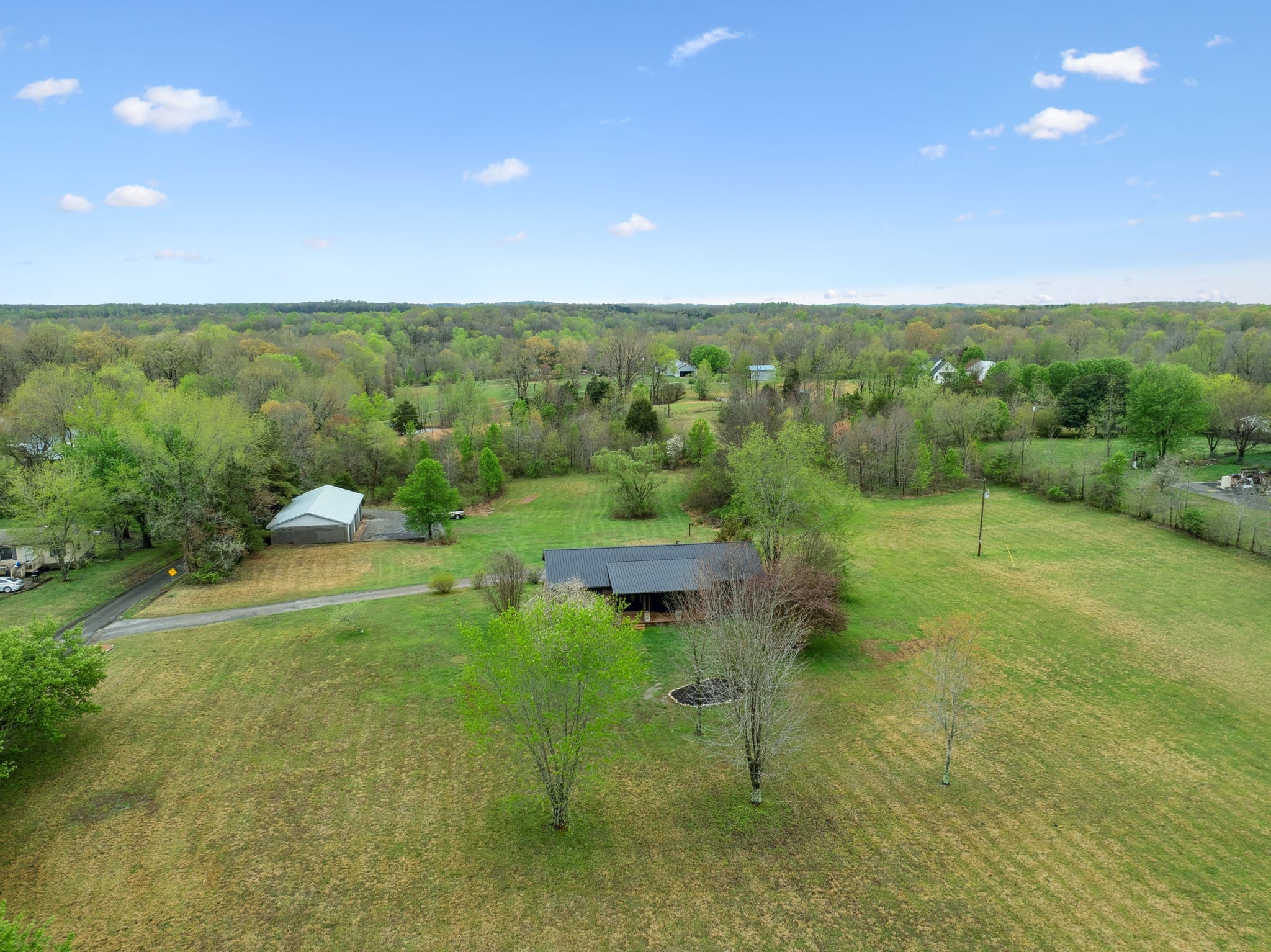 500 Brown Road Bon Aqua, TN 37025 - Photo 29 of 35 a view of a garden with a lake view
