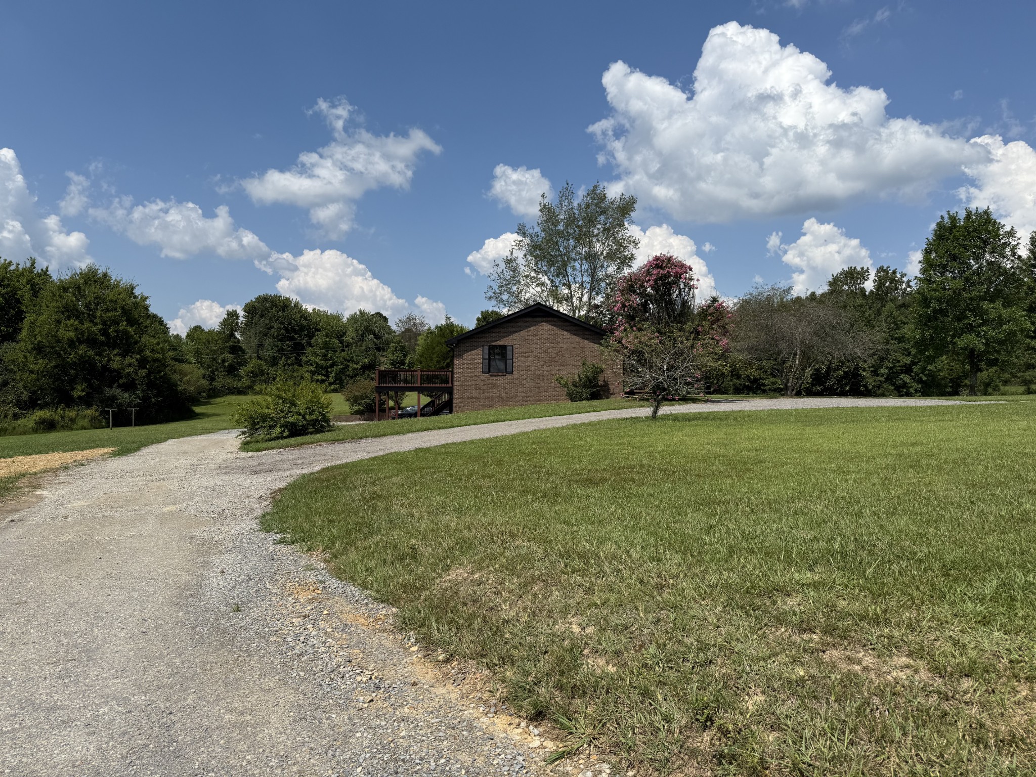 500 Brown Road Bon Aqua, TN 37025 - Photo 34 of 35 a big yard with lots of tress in it