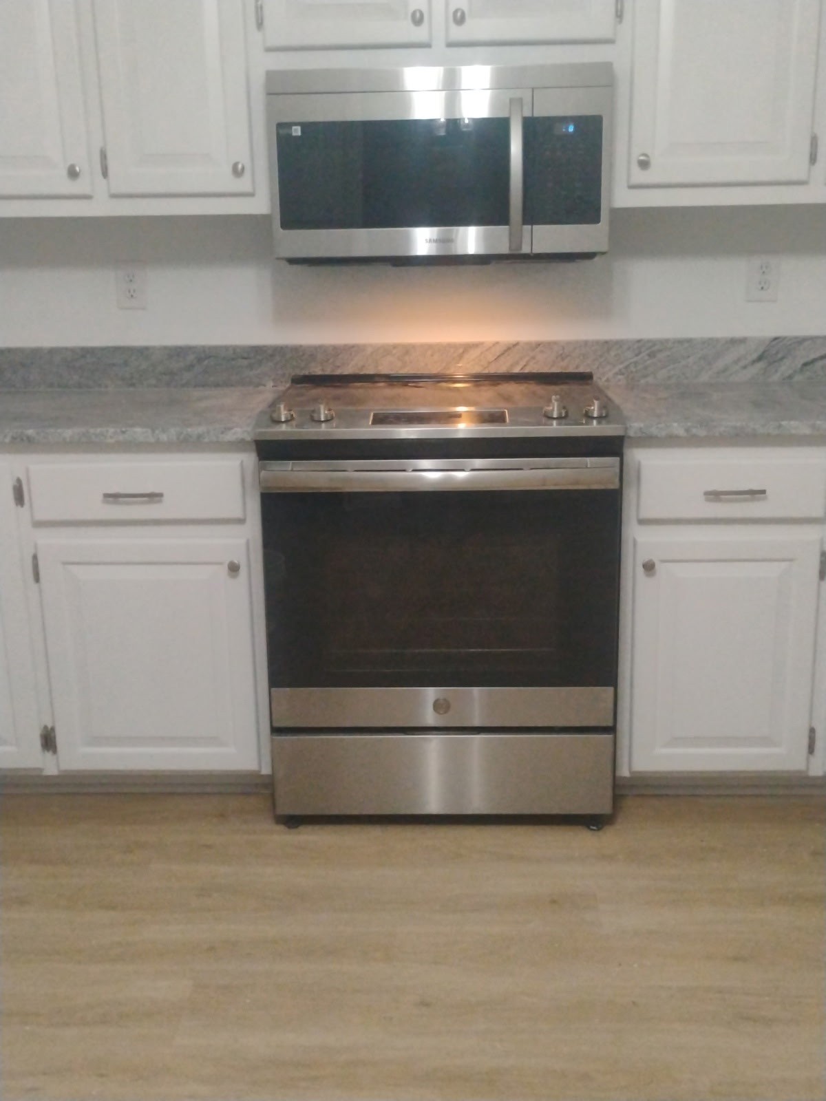 500 Brown Road Bon Aqua, TN 37025 - Photo 35 of 35 a stove top oven sitting inside of a kitchen