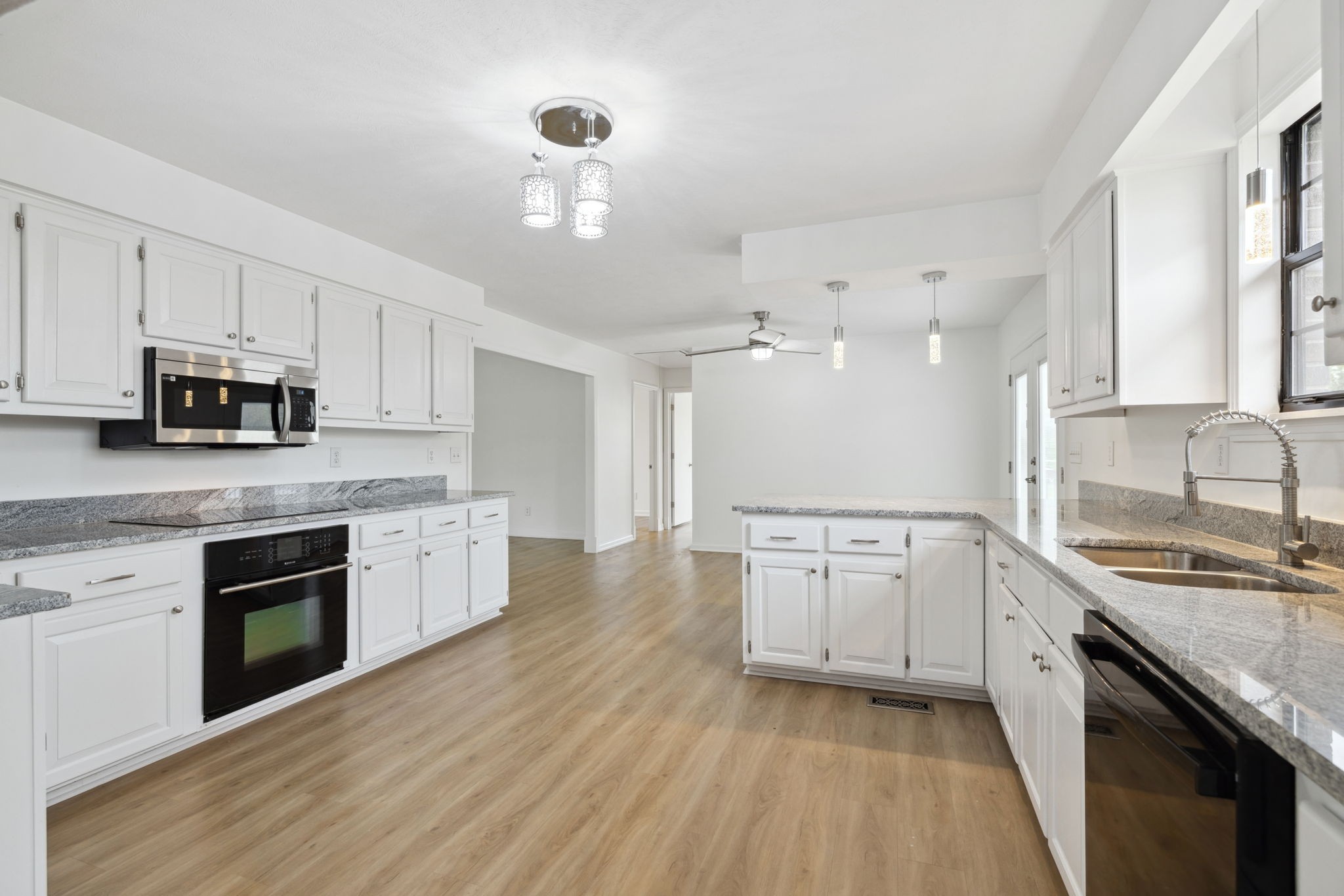 500 Brown Road Bon Aqua, TN 37025 - Photo 8 of 35 a large kitchen with cabinets stove top oven and sink
