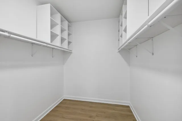 a view of an empty walk in closet