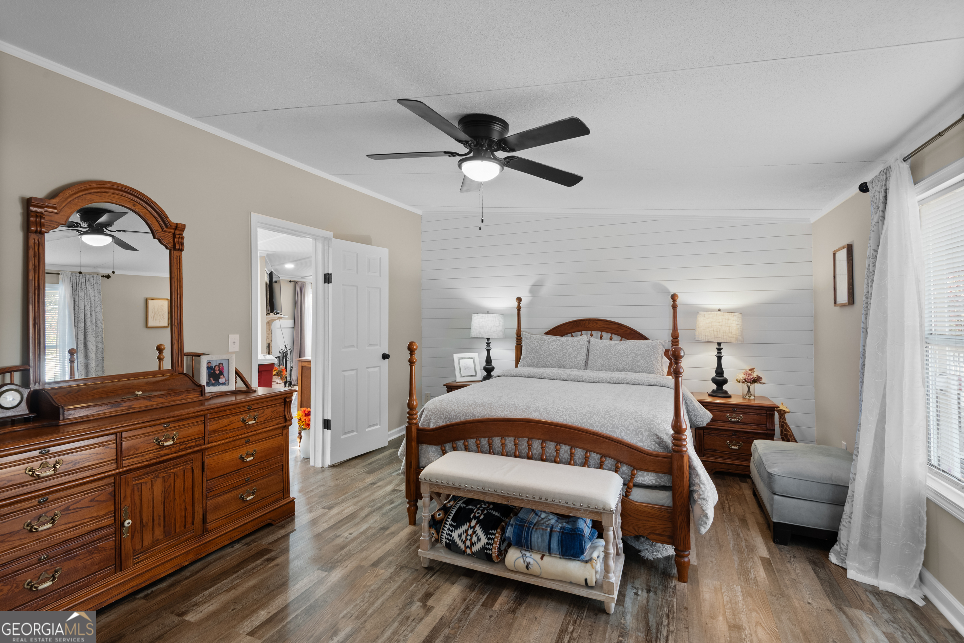 1706 Stark Road Jackson, GA 30233 - Photo 20 of 38 a bedroom with a bed and wooden floor