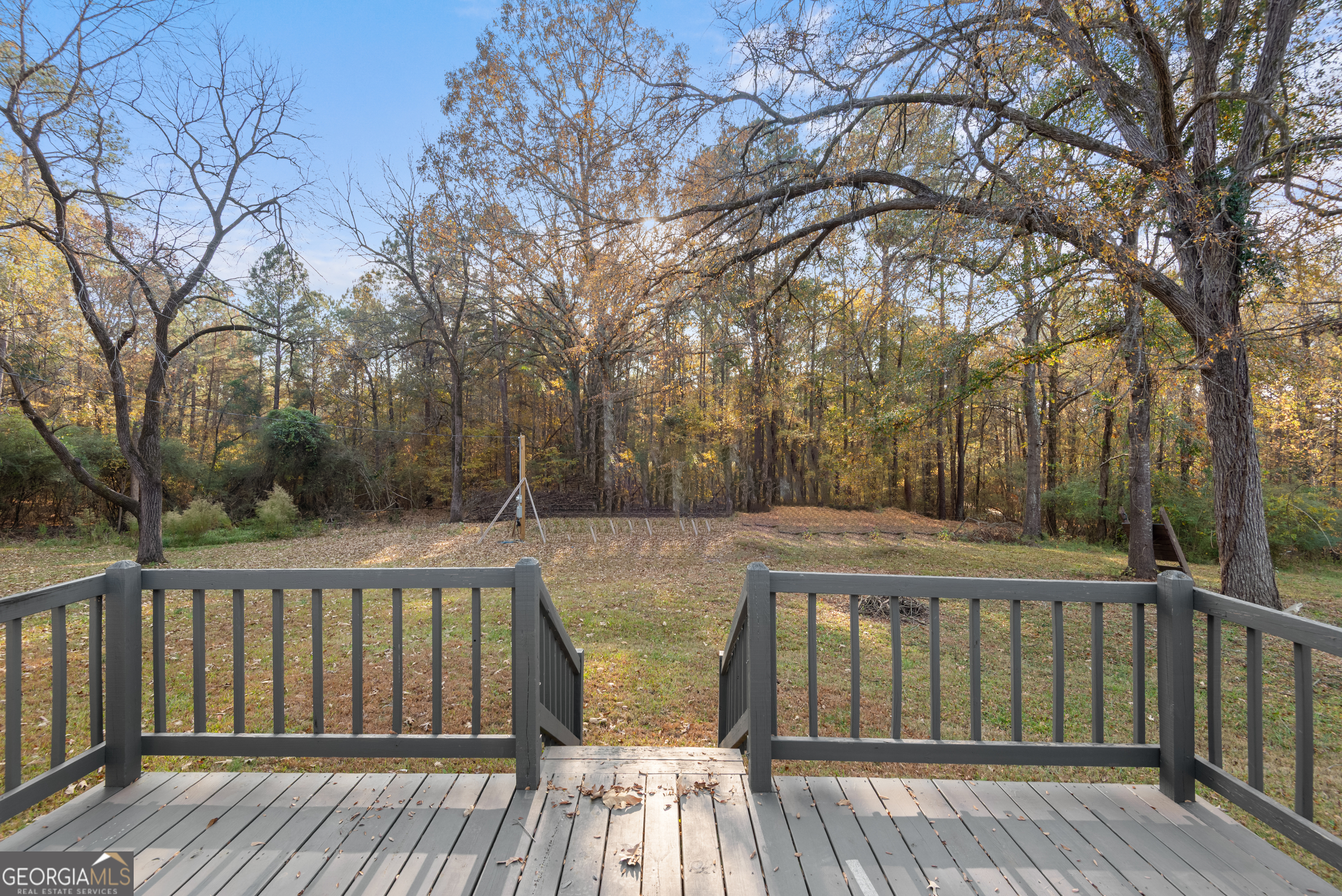 1706 Stark Road Jackson, GA 30233 - Photo 33 of 38 a view of balcony with wooden floor and fence