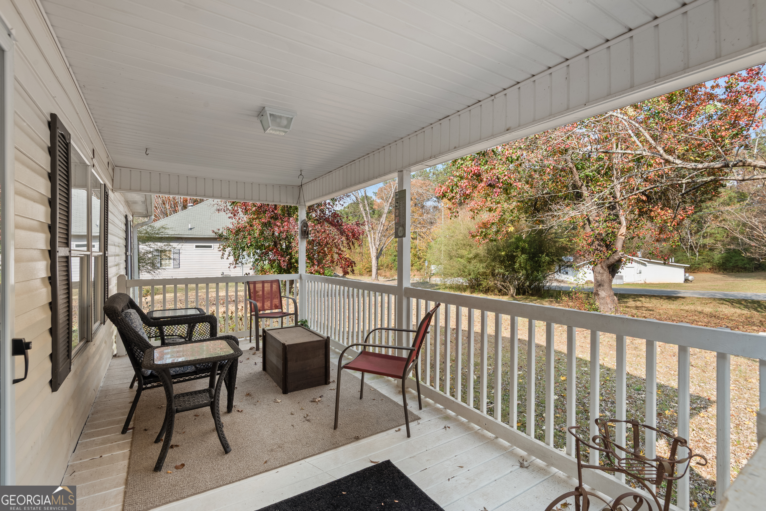 1706 Stark Road Jackson, GA 30233 - Photo 6 of 38 a view of two chairs in the balcony
