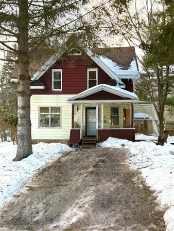 a view of a yard in front of a house