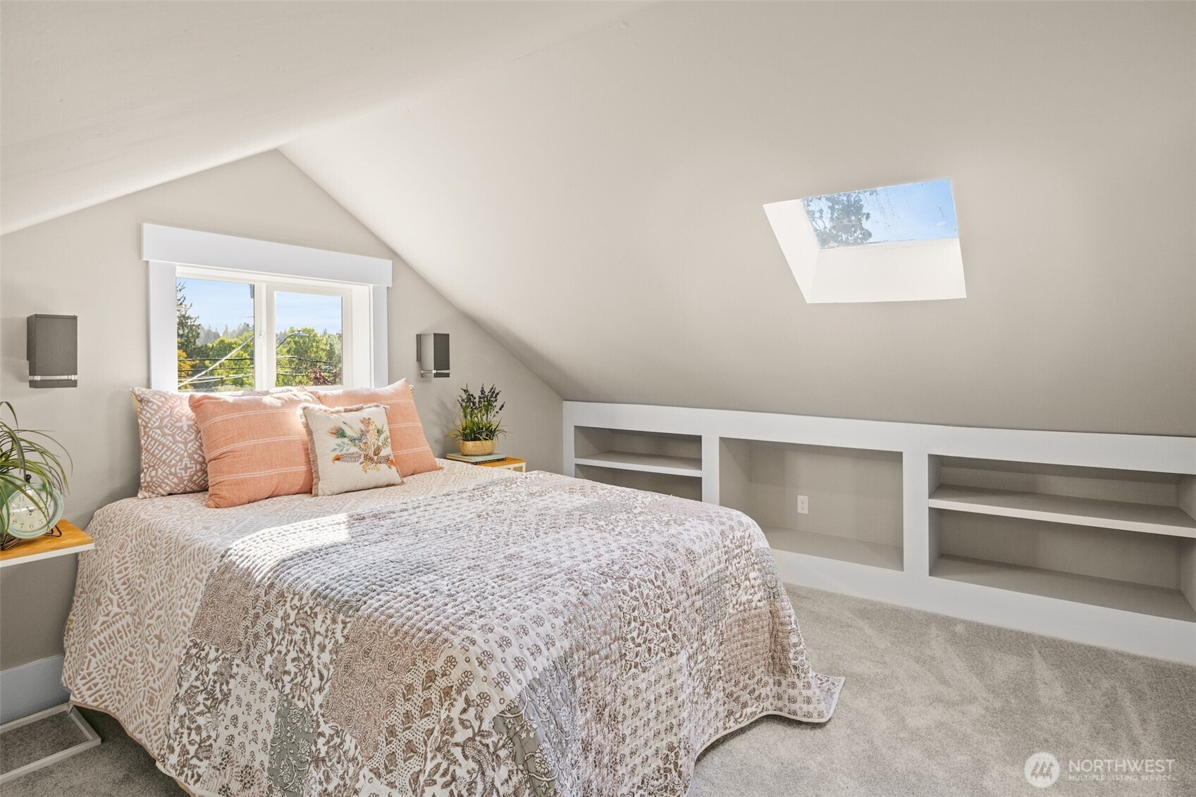 9547 Wallingford Avenue North Seattle, WA 98103 - Photo 24 of 39 a bedroom with a bed and a large window