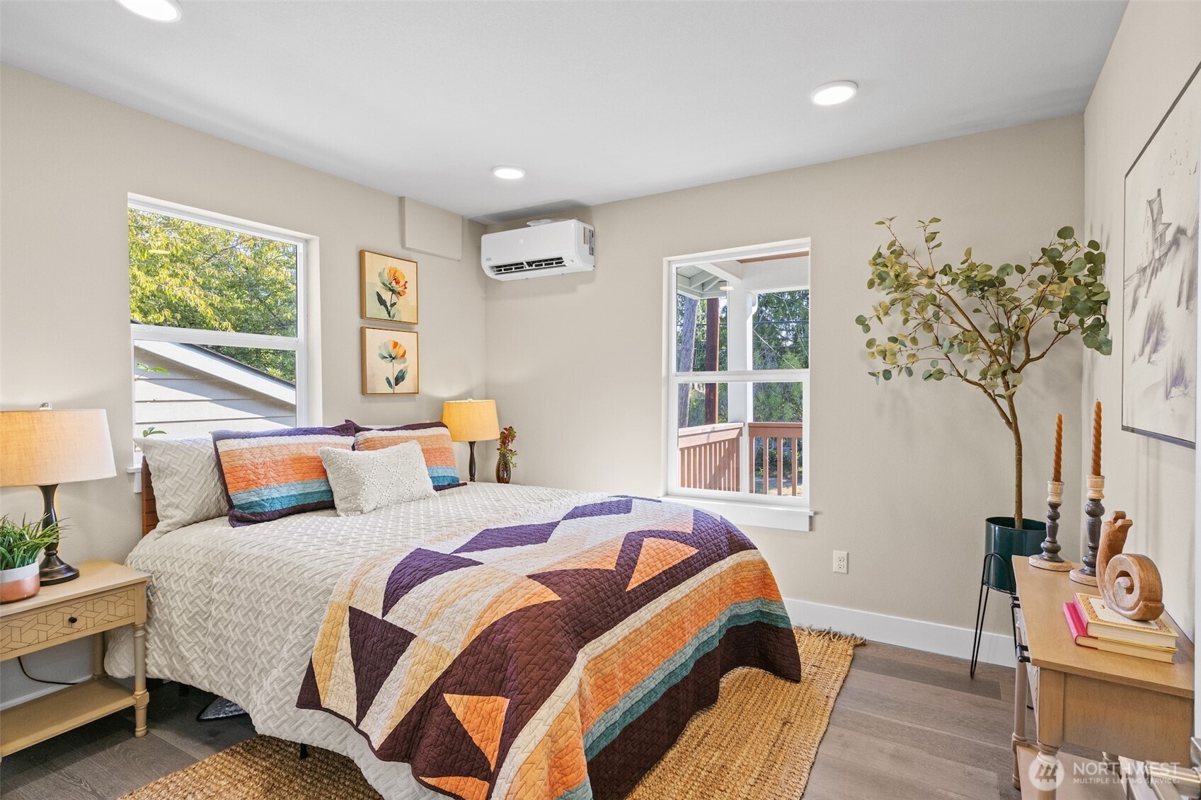 9547 Wallingford Avenue North Seattle, WA 98103 - Photo 8 of 39 a bedroom with a bed and a window