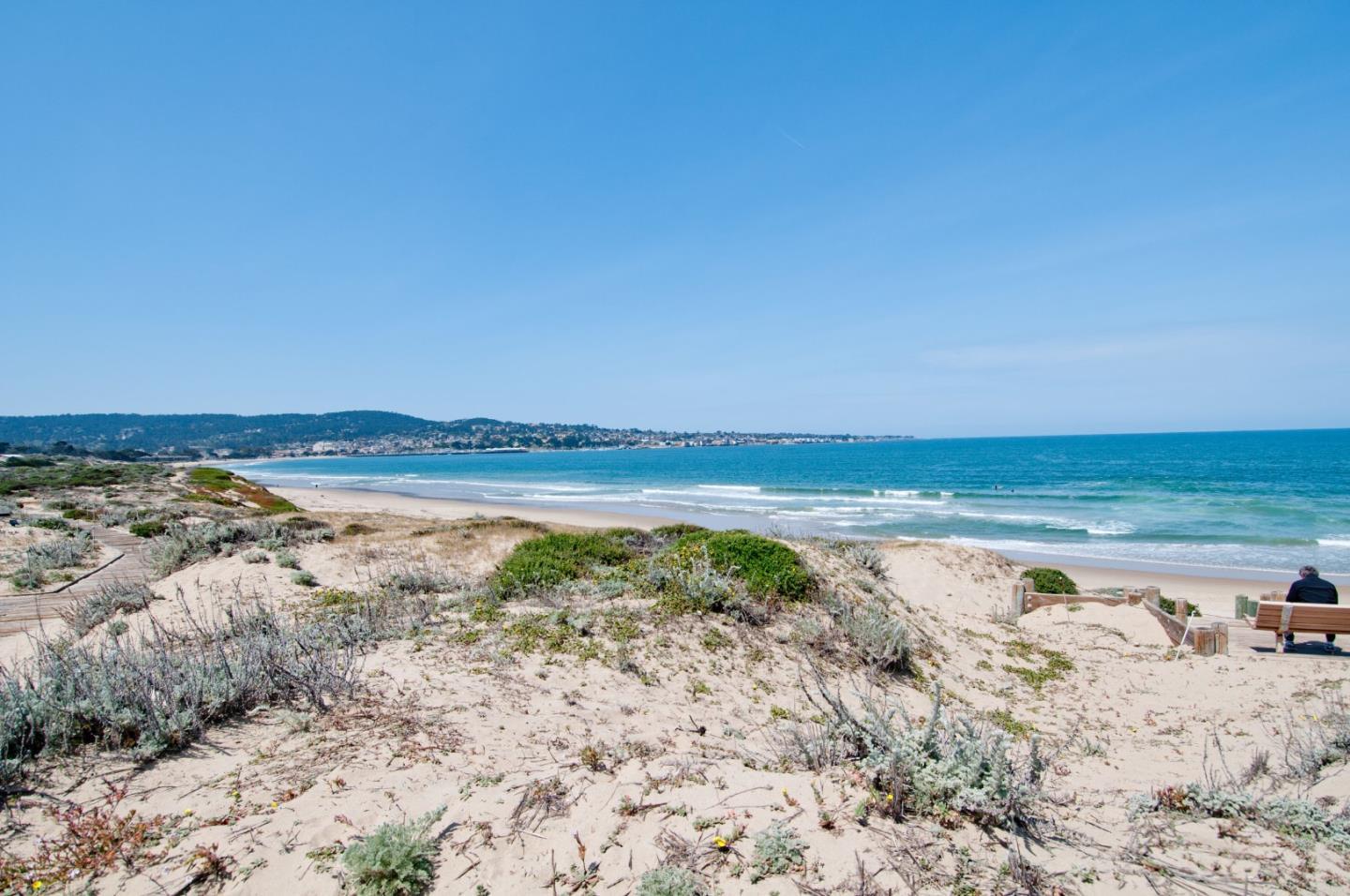 125 Surf Way, Unit 305 Monterey, CA 93940 - Photo 19 of 27 a view of an ocean and beach