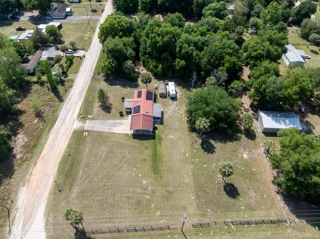 a view of swimming pool in a backyard