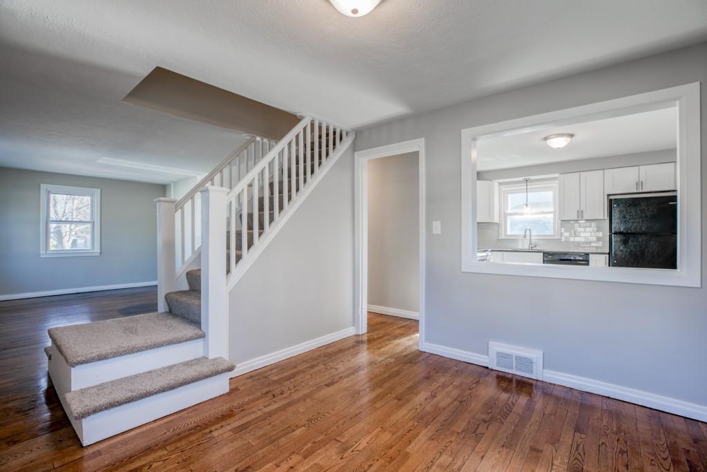71 Peach Street Springfield, MA 01109 - Photo 8 of 21 a view of livingroom with furniture and wooden floor