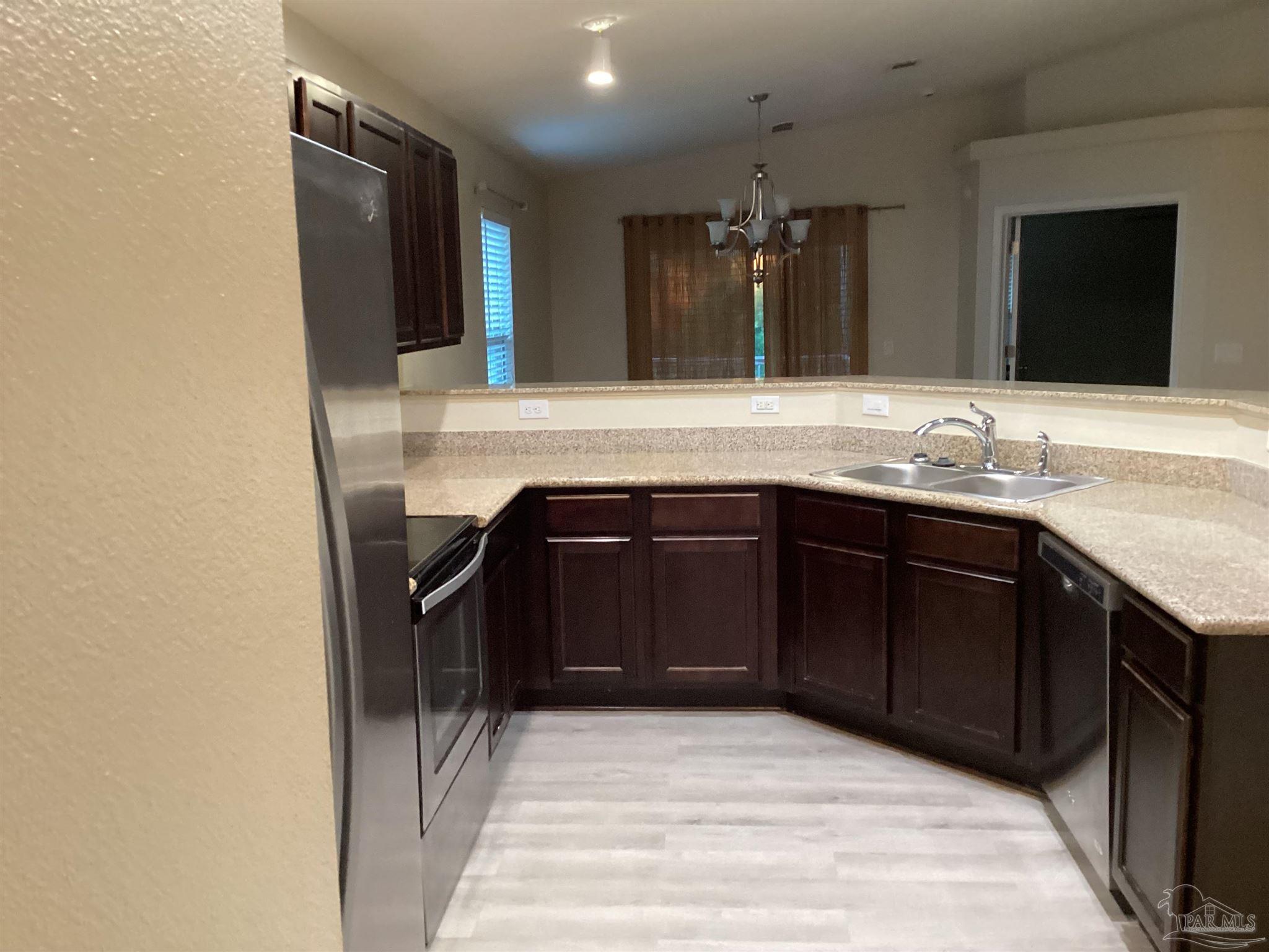 196 Millet Circle Cantonment, FL 32533 - Photo 12 of 20 a bathroom with a sink and a mirror